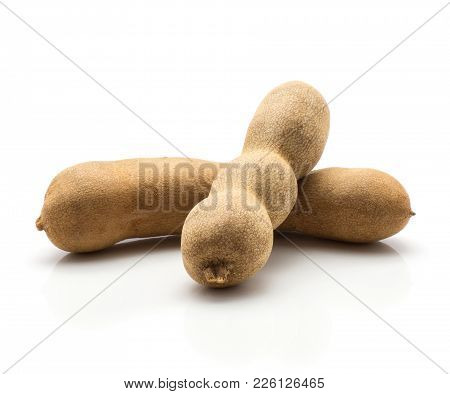 Two Brown Tamarind Isolated On White Background Indian Dates In A Brittle Shell