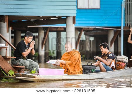Oct 10: 2017 When The End Of Buddhist Lent Day Come, The Buddhist Give Food Offerings To Buddhist Mo