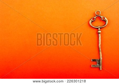 Retro Style Key On A Colorful Background