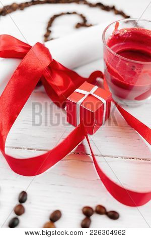 A Gift For Valentine's Day, A Small Box, A Letter And A Candle Of Romance