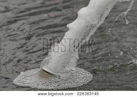 Fountain In The Snow, Similarity Ejaculation From Phalo, Cold Water Beats From The Icy Nozzle. Aroun