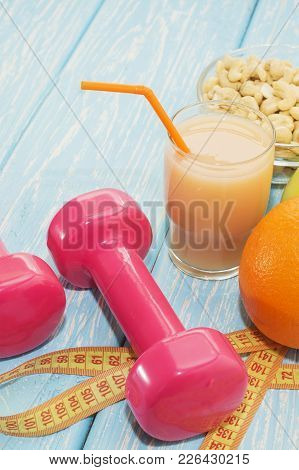 The Concept Of A Healthy Diet. Small Dumbbells, Juice. Apples. Healthy Lifestyle. Sport Fitness Food