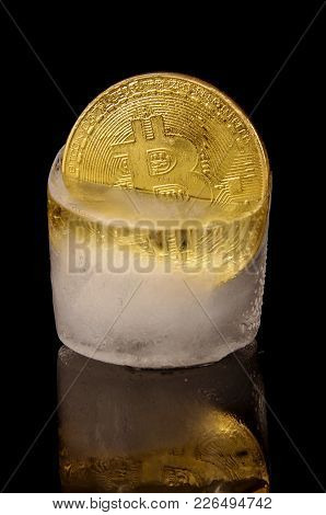 Golden Bitcoin Frozen In The Ice As A Concept Of Restrictions