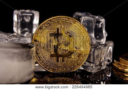 Bitcoin Coin Surrounded By Ice Cubes As A Concept Of Restrictions