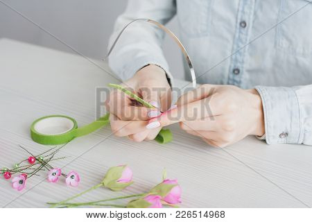 Florist Does A Wreath With Artificial Flowers From Foamiran