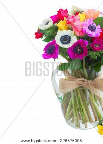 Fresh Anemones And Roses Flowers Bouqet In Glass Vase Close Up Isolated On White Background