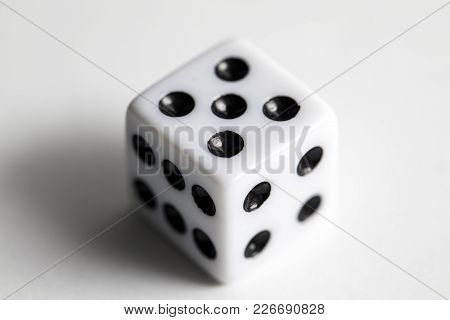 Dice Shot Up Close On A White Background, Five