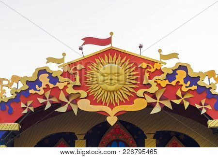 Top Jf The Roof With Maslenitsa Decorations: Sun, Colorful Ribbons.