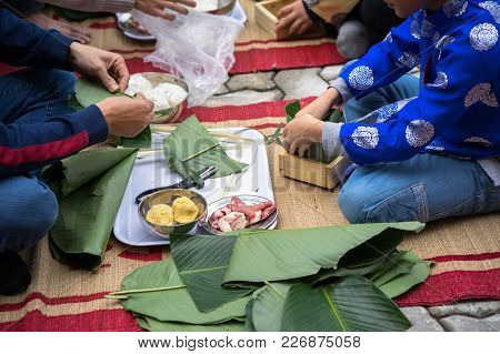 The Son Learning To Make Chung Cake By Hands With His Father Closeup, Chung Cake Is The Most Importa