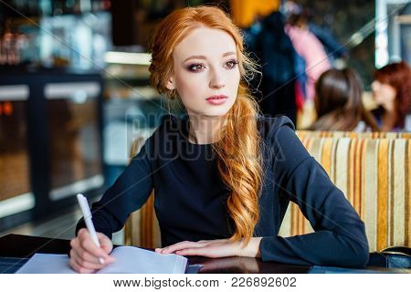 Talented Young Female Journalist Working On Her New Book Review Writing Composition In Notebook Star
