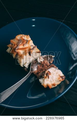 Curd Cake In A Plate Lies On A Wooden Background