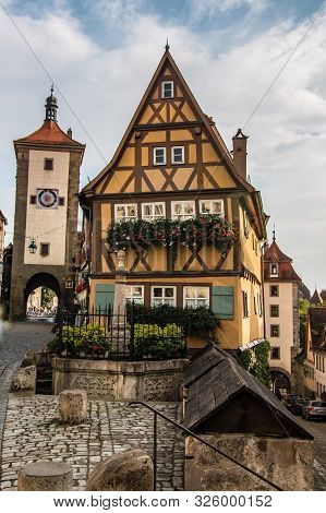 Medieval Old Street In Rothenburg Ob Der Tauber In A  Summer Day, Germany