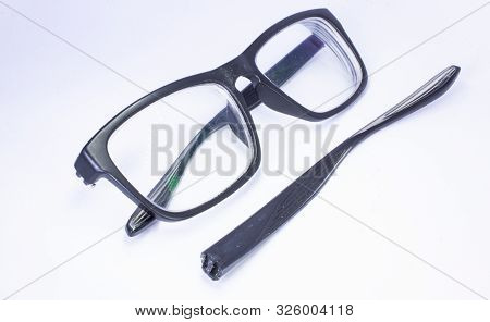 Image Of A Broken Eyeglass Or Spectacle Or Reading Glass Frame With White Background