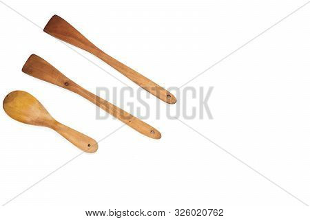 Flat Lay Wood Wooden Spoon Isolated On White Background With Space For Text, Top View