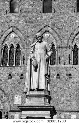 Monument Of Sallustio Bandini From 1882 At Piazza Salimbeni In Siena, Italy