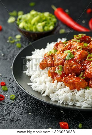 Tsos Chicken With Rice, Green Onion And Broccoli