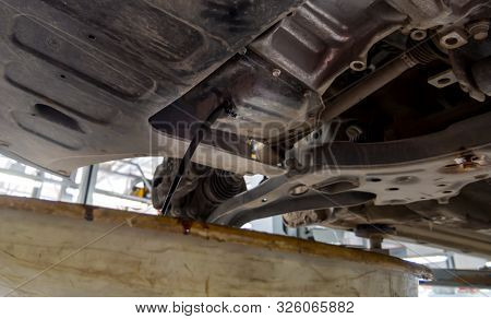 Engine Oil Flowing From The Drain In The Crankcase