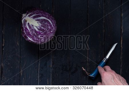 Kitchen Knife And Hand. Knife For Cutting Vegetables.