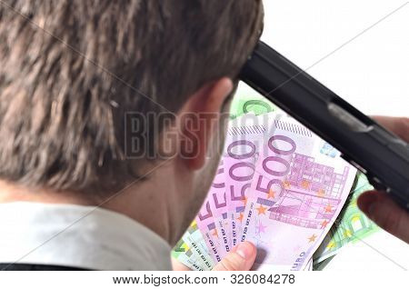 Gun Pistol At The Head - A Man Committing Suicide By Handgun - Holding Euro Banknotes In Hand At Bac