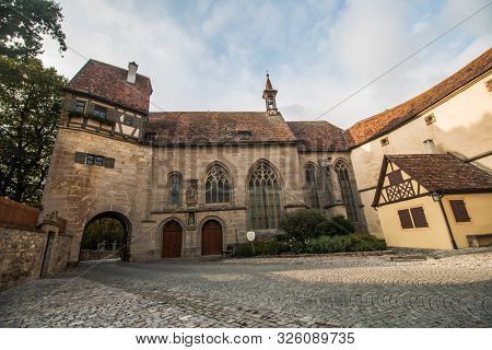 Medieval Old Street In Rothenburg Ob Der Tauber In A  Summer Day, Germany