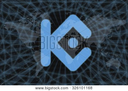 Kucoin Shares (kcs) Abstract Cryptocurrency. With A Dark Background And A World Map. Graphic Concept