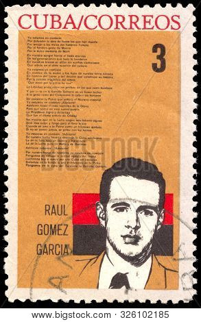 Cuba - Circa 1964: Post  Stamp Printed In Cuba Shows Raul Gomez Garcia And Poem; 11th Anniversary Of