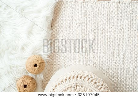 Threads, Crocheted Round Napkin. White Napkin Like A Flower. On A Fur White Background And Knitted L