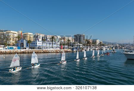 Marbella, Spain - December 2018:  Sailing Boats With Students Of Sailing School Are Arriving To The 