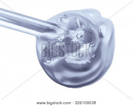 Squeezed cosmetic clear cream gel texture Iisolated on white background. Close up photo of transparent drop of skin care product. High Quality transparent gel with bubbles closeup on white background