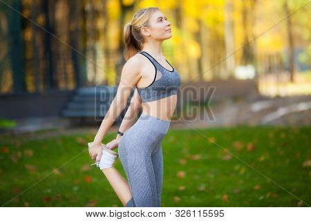 Fitness. Athlete Girl, Thlete Exercise At Outside, Woman Fitness. Young Beautiful Woman Stretching I