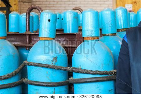 Large Iron Metal Blue Gas Cylinders With Oxygen, Air, Helium Under Excessive Internal Pressure To St