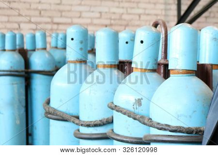 Large Iron Metal Blue Gas Cylinders With Oxygen, Air, Helium Under Excessive Internal Pressure To St