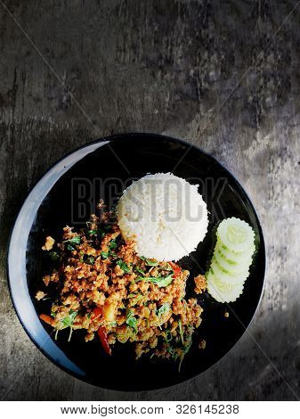 Top View Rice Topped With Stir Fried Minced Pork And Basil