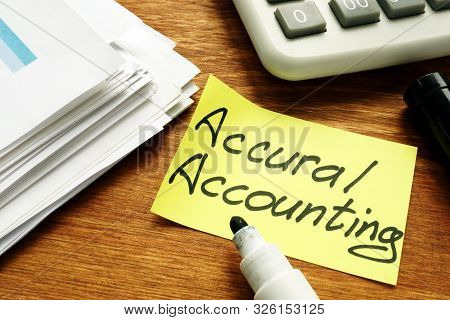 Accrual Accounting Concept. Business Report And Calculator.