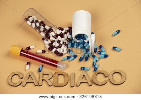 Blood Test Vacuum Tube With Blue Pill With The Word - Cardiaco