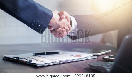 Successful Negotiate And Handshake Concept, Two Businessman Shake Hand With Parthner To Celebration 