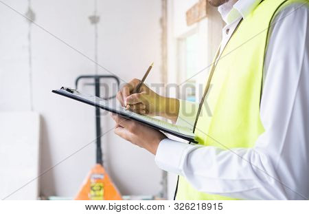 Inspectors Or Engineers Are Checking The Work Of The Contractor In Constructon Site