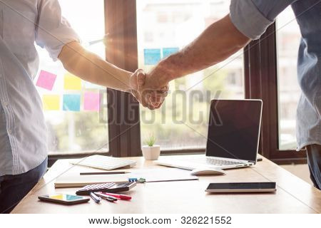 Successful Negotiate And Handshake Concept, Two Businessman Shake Hand With Parthner To Celebration 