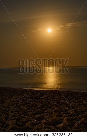 Moonrise Over The Black Sea, Moonlight Path On The Water. Crimea, Russia.