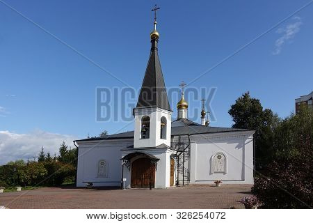 White Orthodox Church Against The Blue Sky