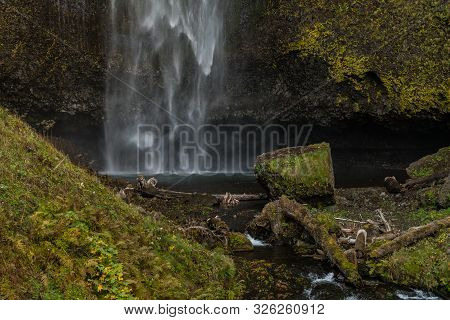 The Lower Part Of The First Level Of The Multnomah Waterfall Located At Multnomah Creek In The Colum