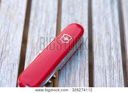 Geneva/switzerland-15.08.18: Victorinox Swiss Army Knife Red Wood