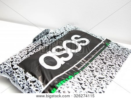 Geneva/switzerland-10.08.18: Asos Online Shopping Clothes Package Logo