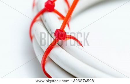 White Cable Wire With Red Zip Tie Ties