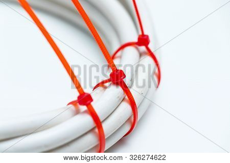 White Cable Wire With Red Zip Tie Ties