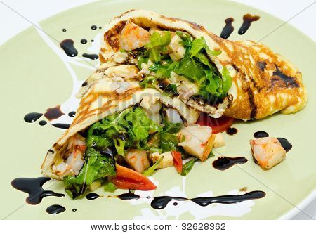 Omelet met Arucola en garnalen