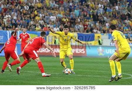 Lviv, Ukraine - June 7, 2019: Roman Yaremchuk Of Ukraine (in Yellow) Kicks A Ball During The Uefa Eu