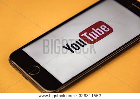 Voronezh. Russia - May 03, 2019: Brand New Apple Iphone 7 With Logo Youtube, On An Orange Background