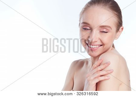 Portrait Of Beautiful Woman With Natural Make Up On White Background