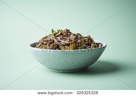Stir-fried Sona With Pork And Vegetables In Asian Style